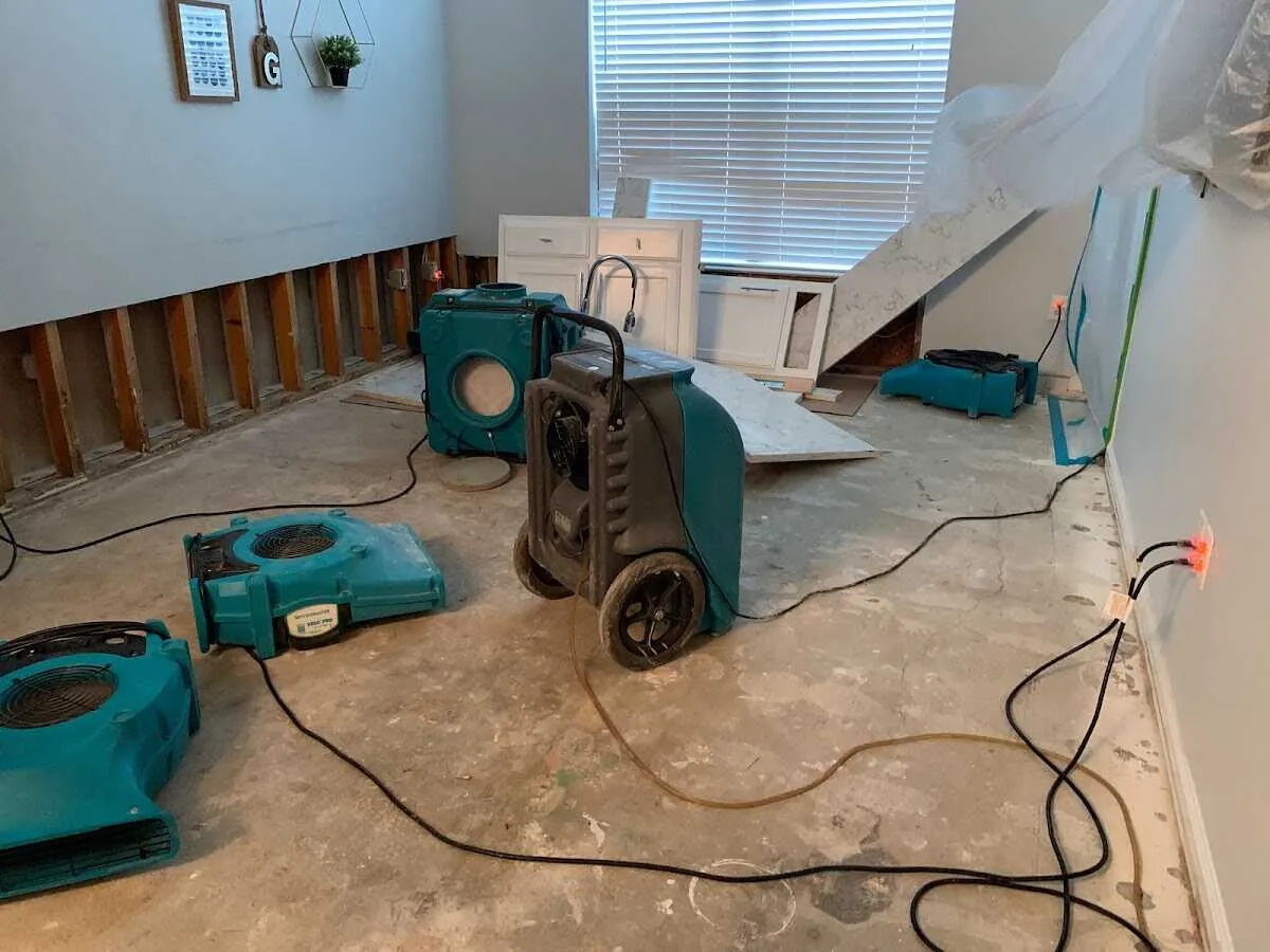 Dehumidifier in flood-cut room for Water Damage Restoration in Van Buren